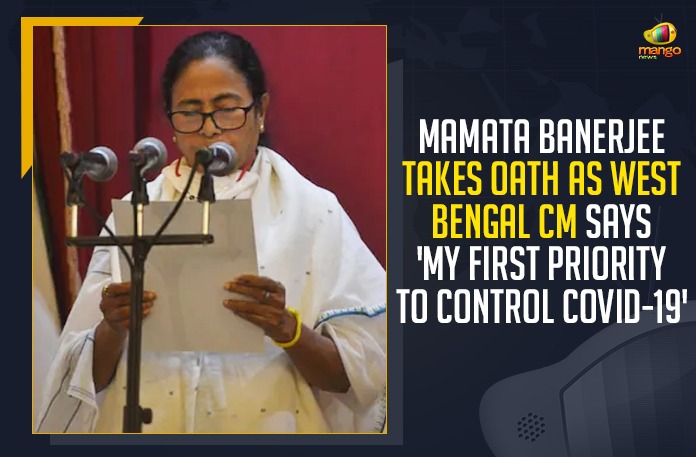 Mamata Banerjee Takes Oath As West Bengal CM, My First Priority To Control COVID-19, Mango News, Latest Breaking News,COVID-19 pandemic, COVID-19 Testing Rules, COVID-19 Surge, COVID-19 Cases, Mamata Banerjee, West Bengal CM, Mamata Banerjee sworn in CM, Chief Minister of West Bengal, West Bengal CM Mamata Banerjee, Mamata Banerjee Oath Swearing-in Ceremony, TMC supremo Mamata Banerjee