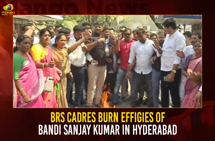 BRS Cadres Burn Effigies Of Bandi Sanjay Kumar In Hyderabad,BRS Burn Bandi Sanjay Effigies,BRS Cadres Burn Effigies,Effigies Of Bandi Sanjay Kumar,Bandi Sanjay Effigies In Hyderabad,Mango News,BRS Calls Protest,BRS Workers Burn Bandi Sanjay Effigy,BRS protests against Bandi's comments,BRS Activists Protest,BRS Leaders Fires On Bandi Sanjay,Derogatory Comments against MLC Kavitha,Bandi Sanjay Faces Backlash,Delhi Liquor Policy Case,BRS Latest News and Updates,Burn Effigy of Telangana BJP Chief,Telangana Political News And Updates