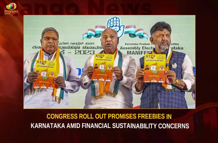 Congress Roll Out Promises Freebies In Karnataka Amid Financial Sustainability Concerns,Congress Roll Out Promises Freebies In Karnataka,Congress Financial Sustainability Concerns,Promises Freebies In Karnataka,Mango News,Election Promises,Congress Financial Sustainability,Party Manifesto,Congress Party,Freebies promised by Congress,Challenge for Congress,Karnataka Latest News,Karnataka Latest Updates,Karnataka Live News,Karnataka Congress Latest News and Updates