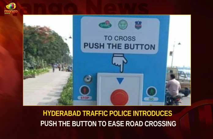 Hyderabad Traffic Police Introduces Push The Button To Ease Road Crossing,Hyderabad Traffic Police,Traffic Police Introduces Push The Button,Push The Button To Ease Road Crossing,Mango News,Pedestrians can now push this button,Police to identify more junctions,Police for pedestrian safety,Pelican Signals installed,As a part of Pedestrian Safety,Hyderabad Traffic Police Latest News,Hyderabad Traffic Police Latest Updates,Hyderabad Traffic Police Live News,Hyderabad Traffic Police Live Updates,Hyderabad Road Crossing Latest News,Hyderabad Road Crossing Latest Updates
